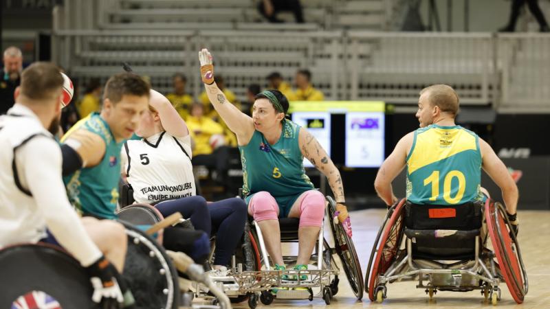 Major Liz Daly competes for the ball during the wheelchair rugby competition at Invictus Games Vancouver Whistler 2025. Photo by WOFF Ricky Fuller. 