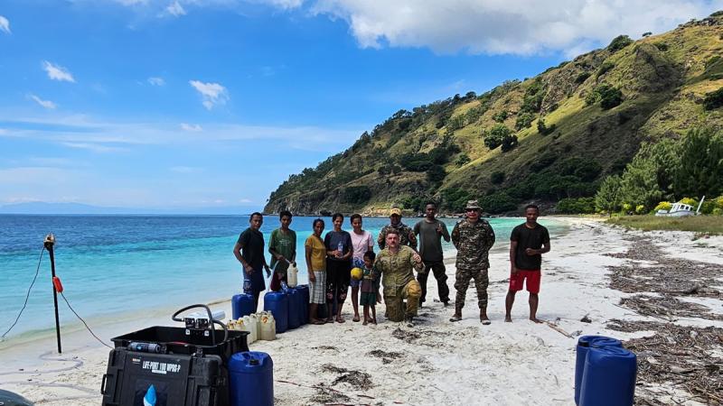 Australian Army Sergeant Heath Crotty and Timor-Leste Defence Force personnel deploy water-purification technology on Arkrema Beach.